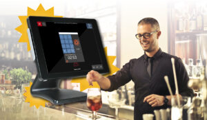 A point of sales system, OrderCounter, is in the foreground. In the background, you can see a bartender mixing up a cocktail with a smile.
