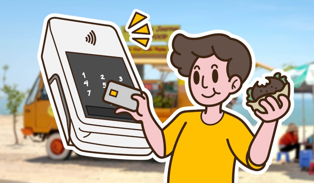 A cartoon person holding up a credit card in front of a cartoon food truck while eating a cupcake.